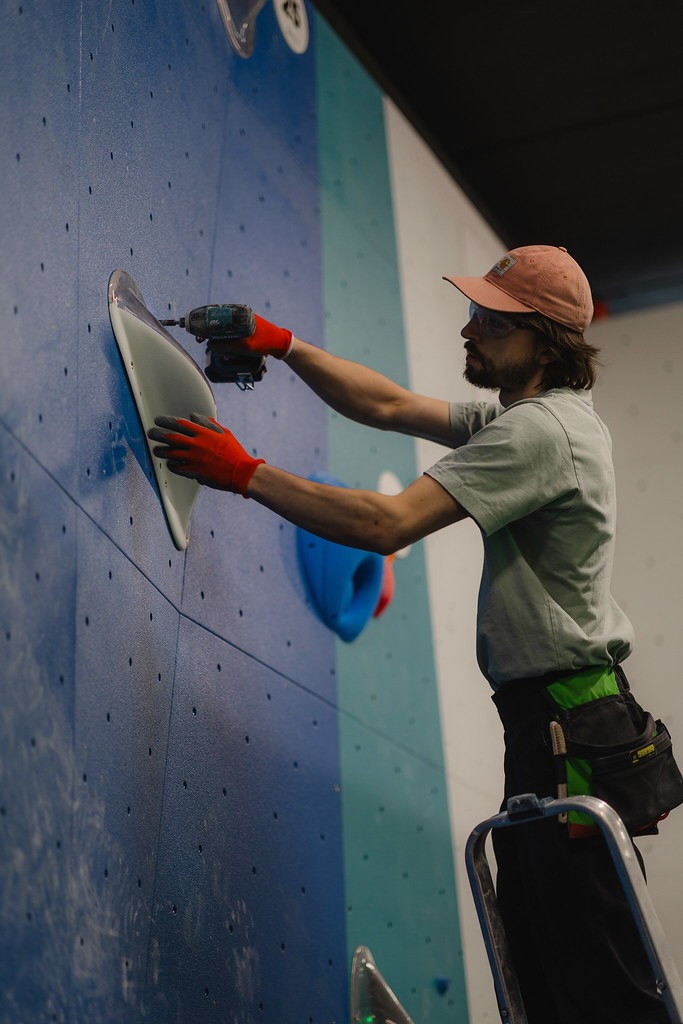 Photo of me routesetting